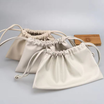 Op maat gemaakte kleur Luxury Lady PU Leather Drawstring Cosmetic Pouch met op maat gemaakte logo