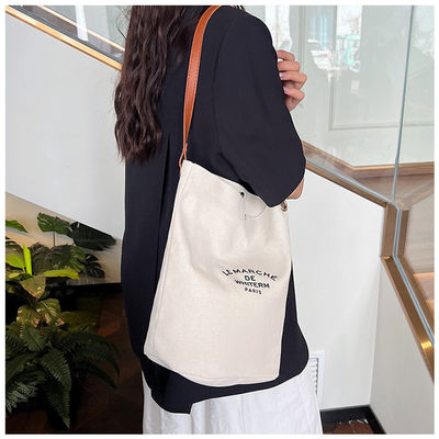 Nieuwste modieuze medium canvas vrouwelijke emmerzak voor 2024 zomer Crossbody printing