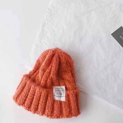 Gepersonaliseerd logo Vaste kleur Japanse Twist gebreide hoed voor de herfst en winter studenten