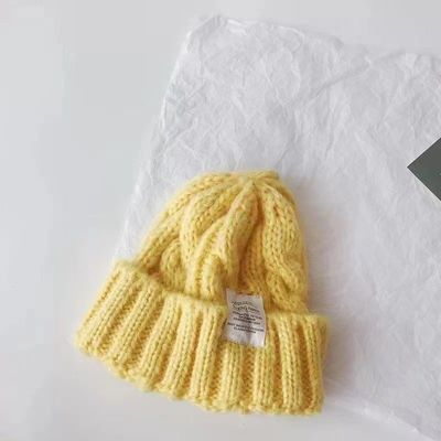 Gepersonaliseerd logo Vaste kleur Japanse Twist gebreide hoed voor de herfst en winter studenten