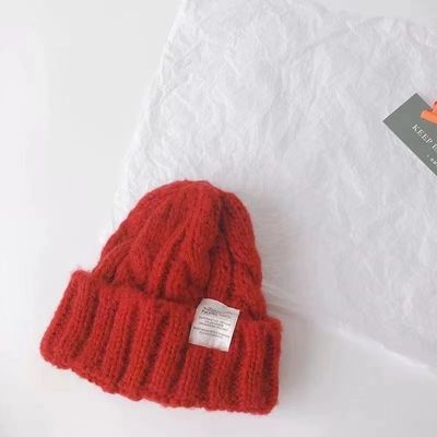 Gepersonaliseerd logo Vaste kleur Japanse Twist gebreide hoed voor de herfst en winter studenten
