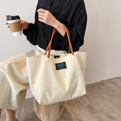 Nieuwste mode aangepaste logo Canvas Pocket grote capaciteit student enkel schouder tas