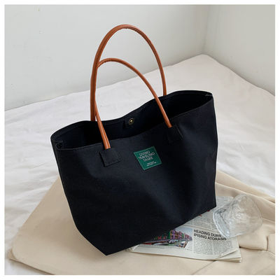 Nieuwste mode aangepaste logo Canvas Pocket grote capaciteit student enkel schouder tas