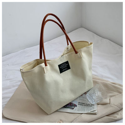 Nieuwste mode aangepaste logo Canvas Pocket grote capaciteit student enkel schouder tas
