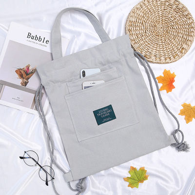 Studentenles Handtas Custom Logo Canvas rugzak met trekgordel sluiting en dubbele...