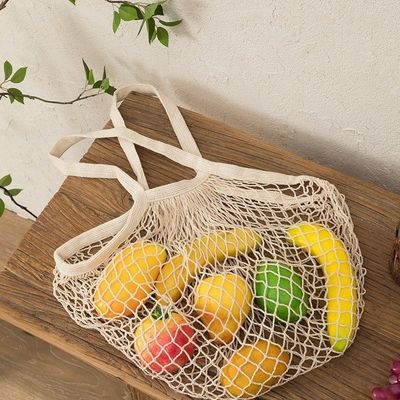 Lange handvaten voor het winkelen van groenten en fruit van biologisch herbruikbaar katoen