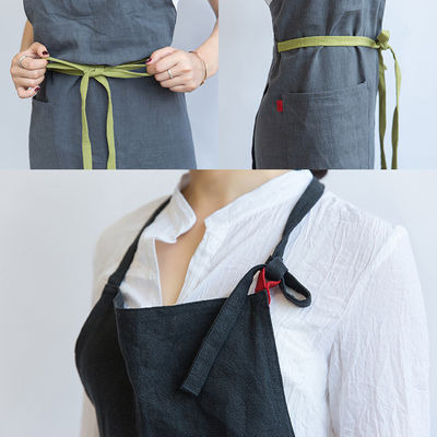 Nieuwste modieuze Unisex Custom katoenen linnen kruis rug verstelbare Bib schort met zakken
