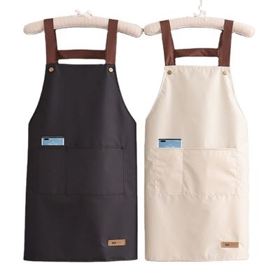 Kleurrijke katoenen polyester kokkoek met verstelbare riemen op doekstof