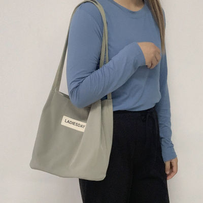 Japanse Nylon Waterdichte Tas voor Vrouwen Eenvoudige en Functionele Winkelbegeleider