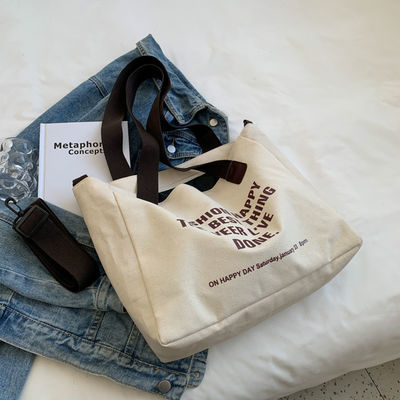 Gepersonaliseerde logo brief katoenen doek Tote zak met polyester bekleding en grote capaciteit