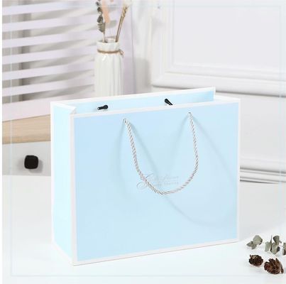 Op maat gedrukte winkeltas karton luxe witte kraftpapier cadeautas met lintgreep