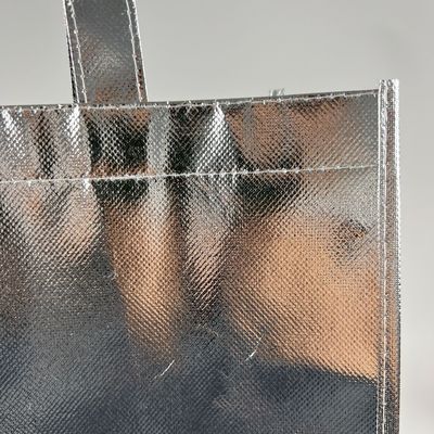 Eco-vriendelijke winkeltas Goud gelamineerd Metalen zilveren niet-geweven tas met aangepast logo