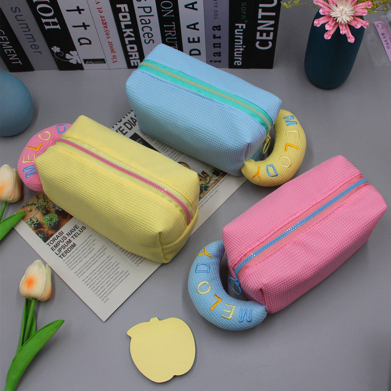 Acceptabele OEM/ODM make-up tas Draagbare cartoon toiletgoed Wafel cosmetische tas voor meisjes